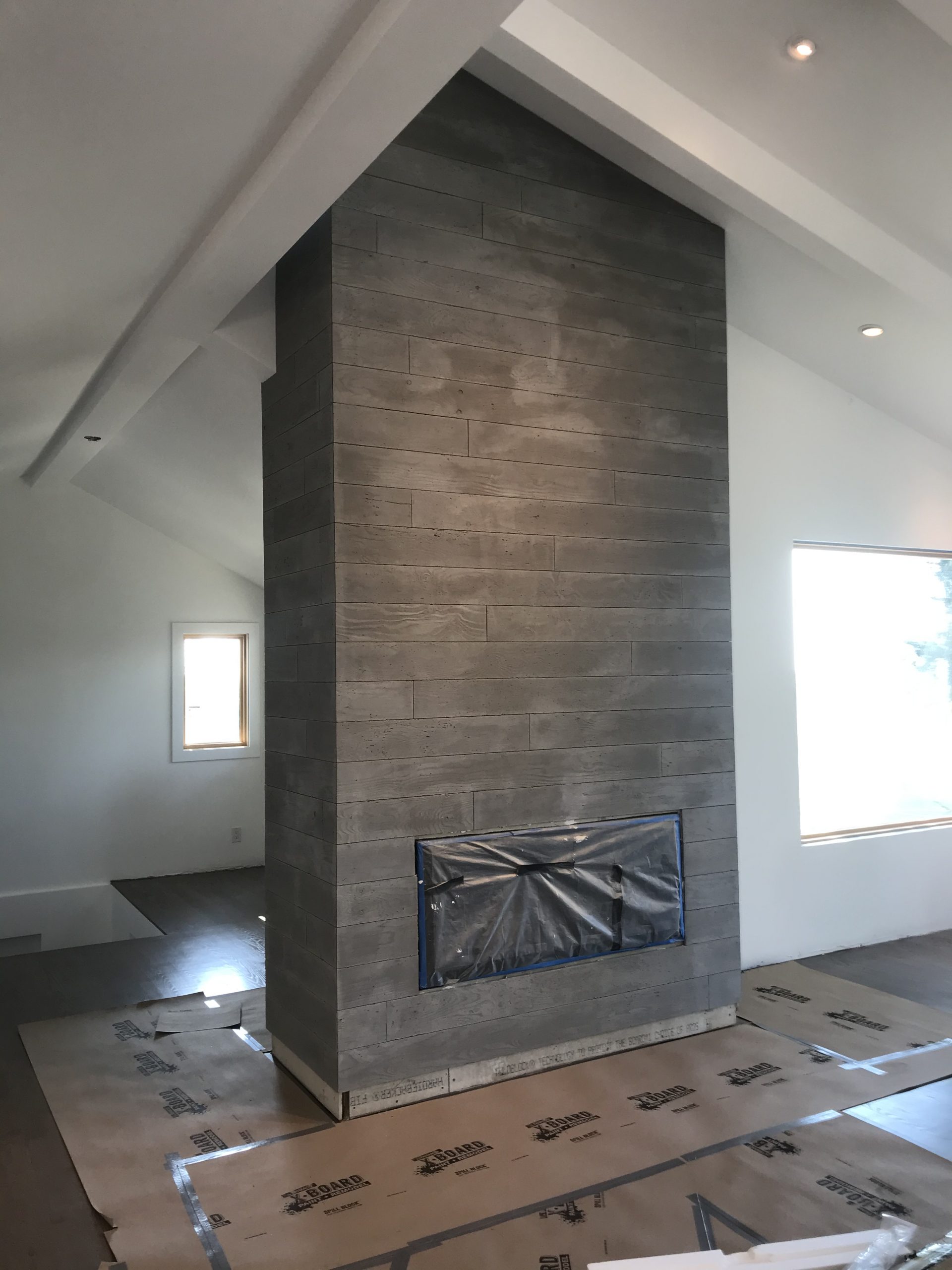 Rental unit with concrete board chimney