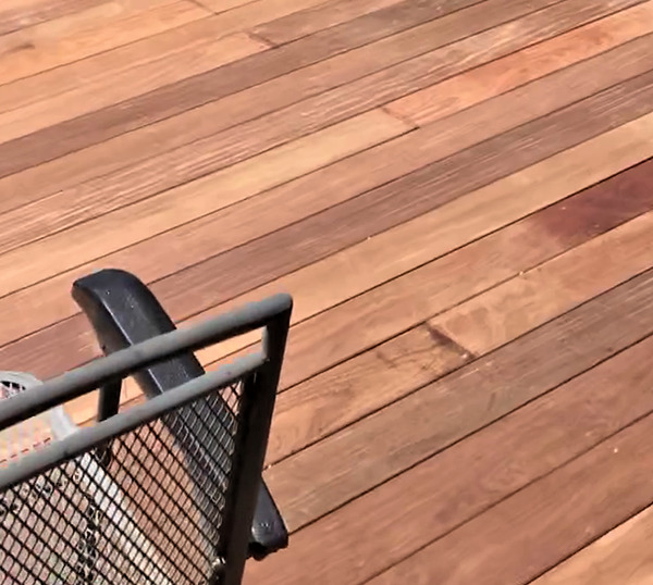 finished backyard deck addition with top-quality wood 