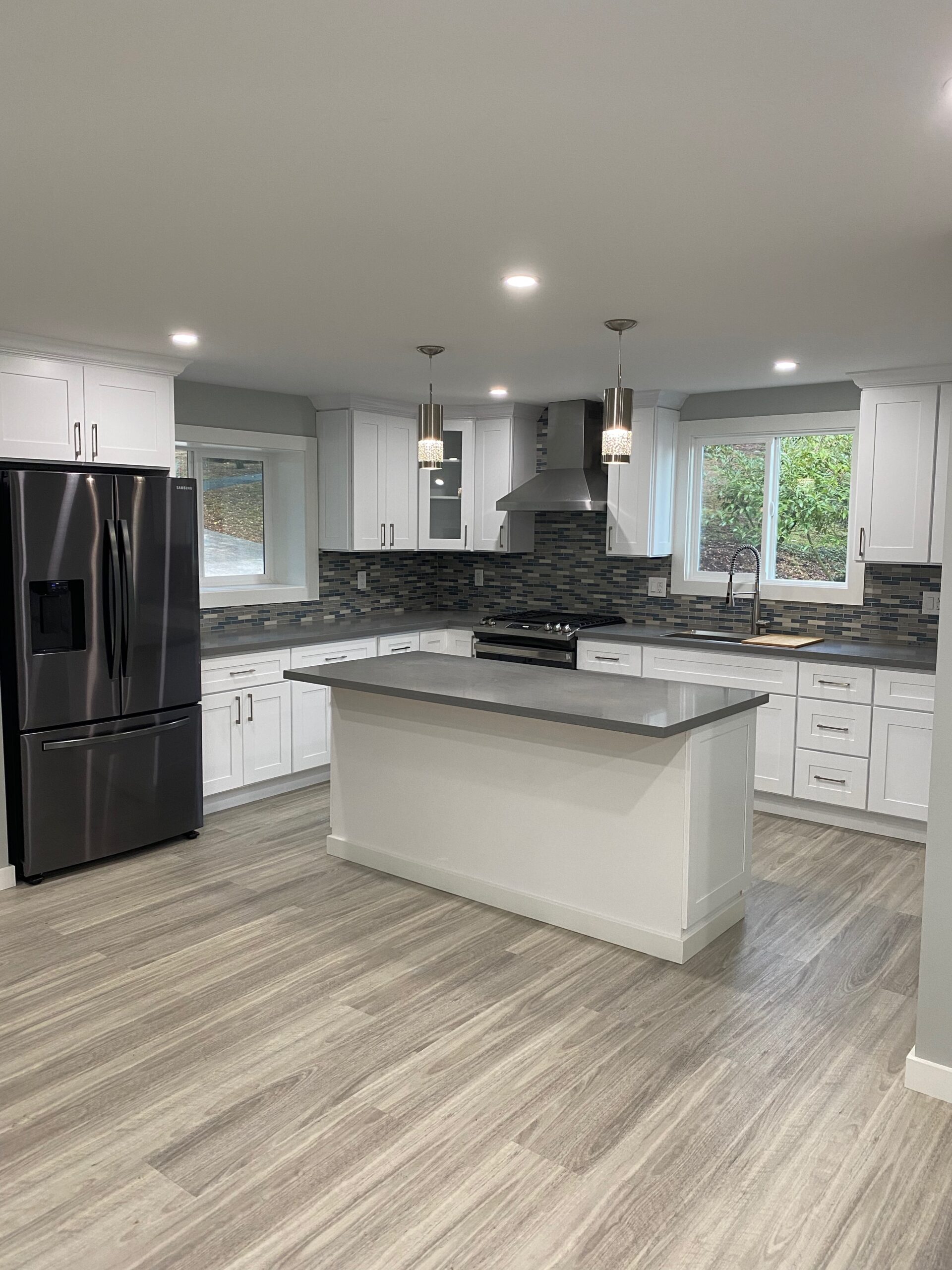 Accessory Dwelling Unit with modern kitchen, backsplash, and kitchen island in San Jose, CA